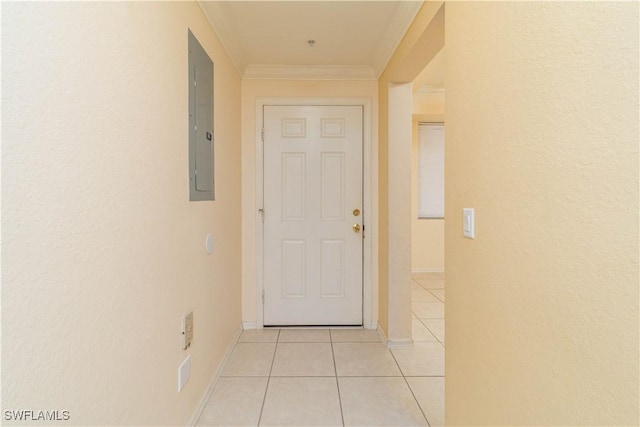 corridor with crown molding, electric panel, and light tile patterned flooring