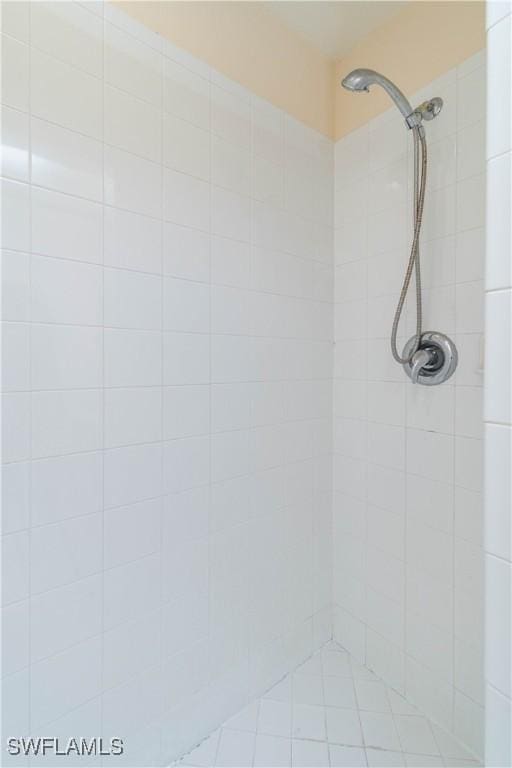 room details with a tile shower