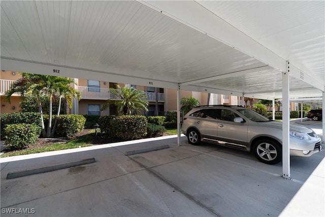 view of car parking featuring a carport