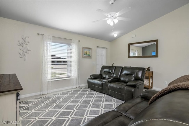 living room featuring vaulted ceiling and ceiling fan