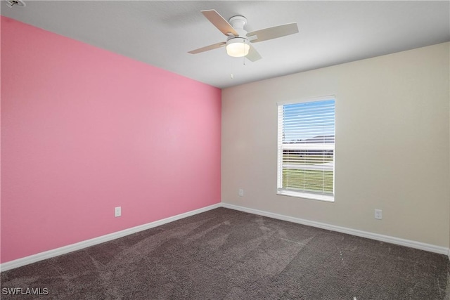 carpeted empty room with ceiling fan