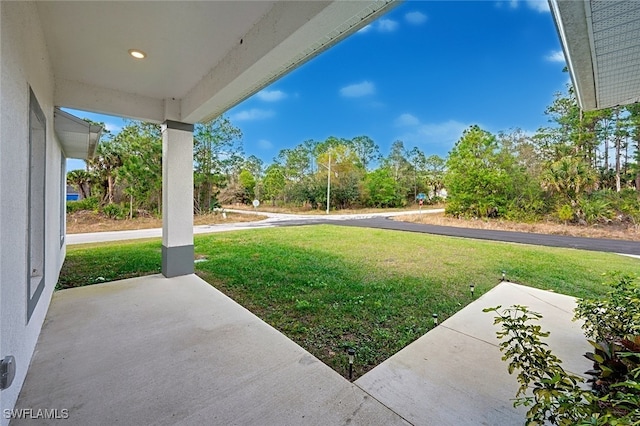 view of yard with a patio area