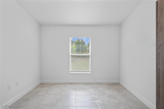 view of tiled spare room