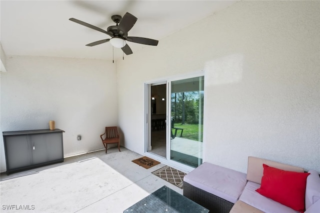 view of patio / terrace featuring ceiling fan