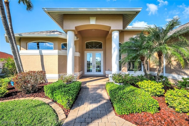 doorway to property featuring french doors