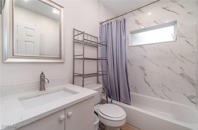 full bathroom with shower / bathtub combination with curtain, vanity, and toilet