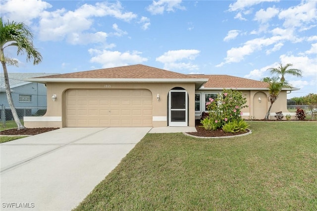 ranch-style home featuring a garage and a front lawn