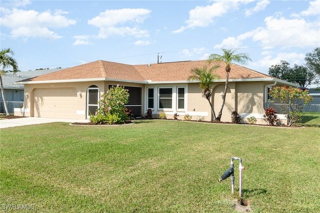 ranch-style home with a garage and a front yard