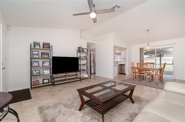 living room featuring light tile patterned flooring, ceiling fan, and lofted ceiling