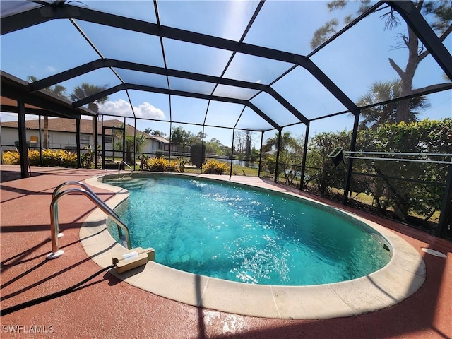 view of pool featuring a lanai and a patio area