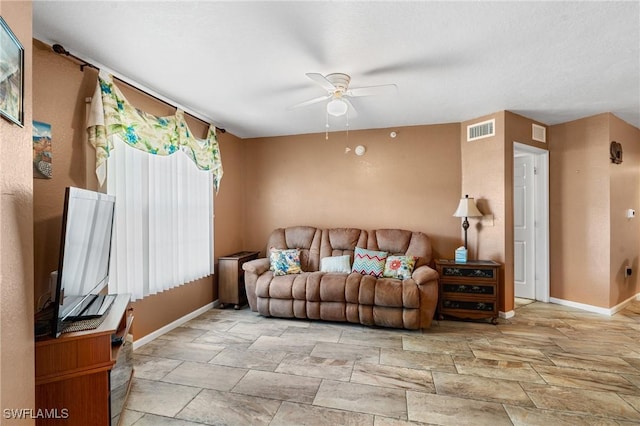 living room with ceiling fan