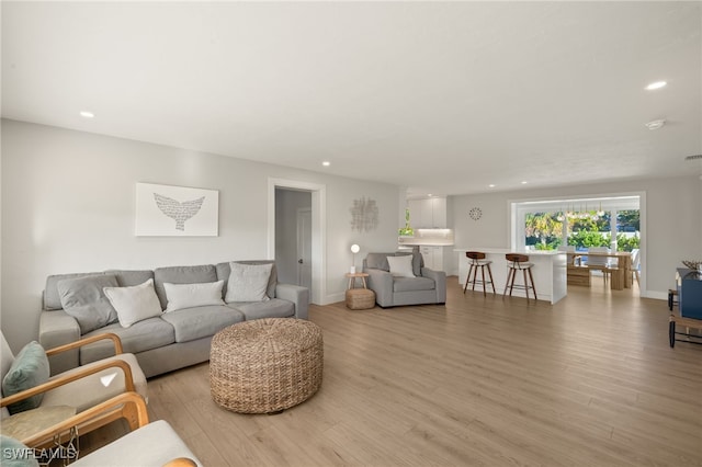 living room with light hardwood / wood-style floors