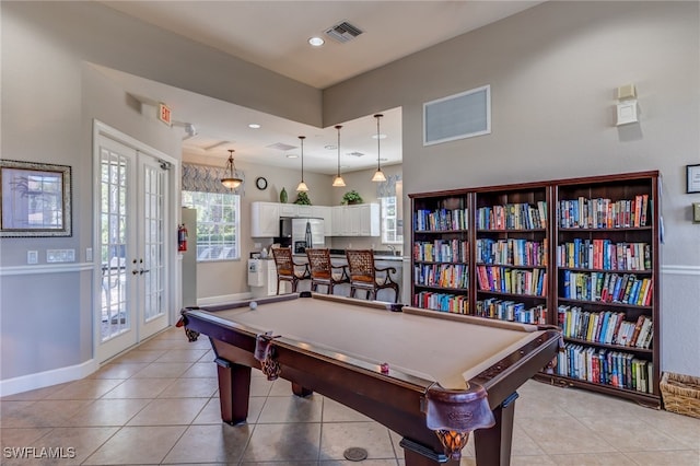 rec room featuring light tile patterned floors, recessed lighting, visible vents, and french doors