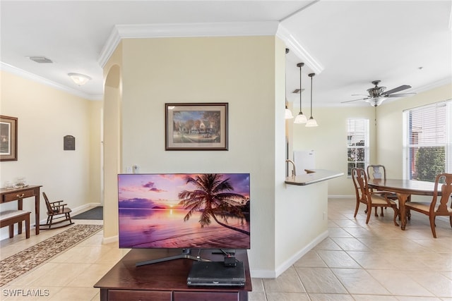 corridor featuring baseboards, visible vents, arched walkways, crown molding, and light tile patterned flooring