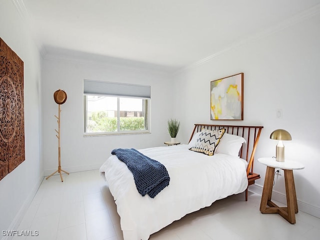 bedroom featuring crown molding