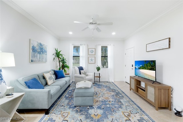 living room with ornamental molding, ceiling fan, and light tile patterned flooring