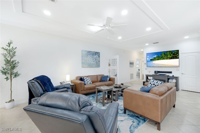 tiled living room featuring ceiling fan