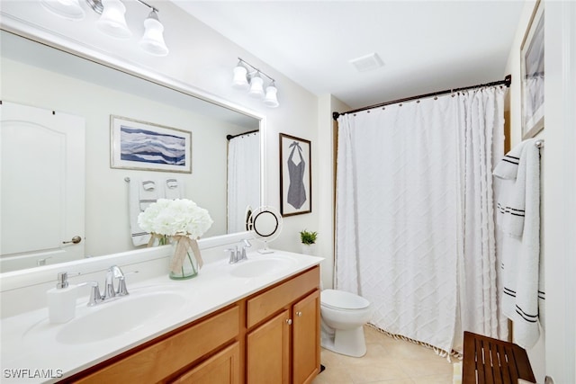 bathroom with vanity, a shower with shower curtain, tile patterned floors, and toilet