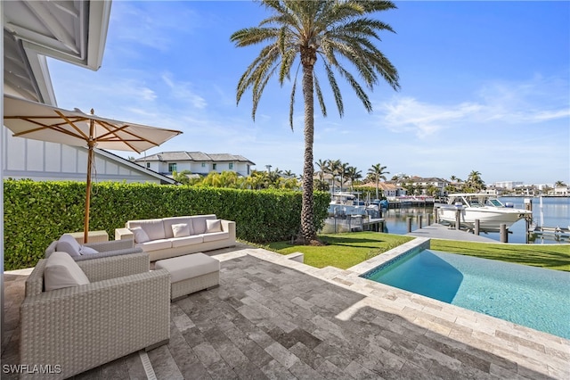 view of pool with a water view, an outdoor living space, a patio, and a boat dock