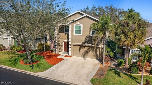 view of front of home with a garage and a front yard