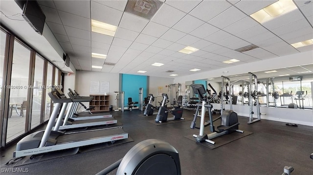 gym featuring a drop ceiling