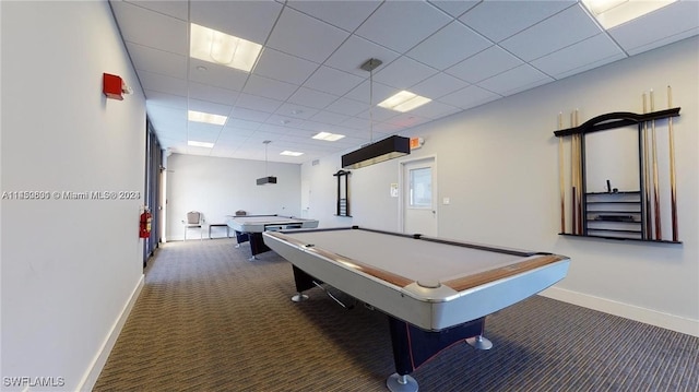 recreation room with dark carpet, a paneled ceiling, and pool table