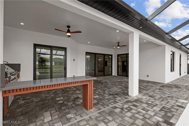 view of patio / terrace with ceiling fan