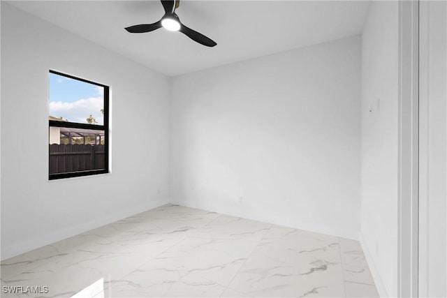 unfurnished room with ceiling fan