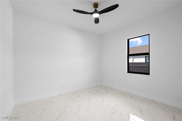 unfurnished room with ceiling fan