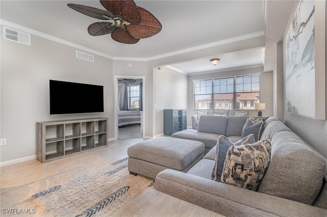 tiled living area featuring ceiling fan, visible vents, and baseboards