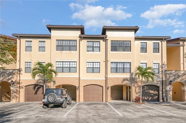 view of building exterior with an attached garage