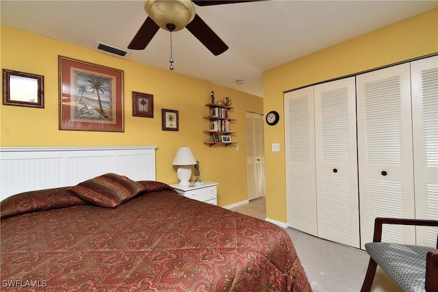 bedroom with light carpet, a closet, and ceiling fan