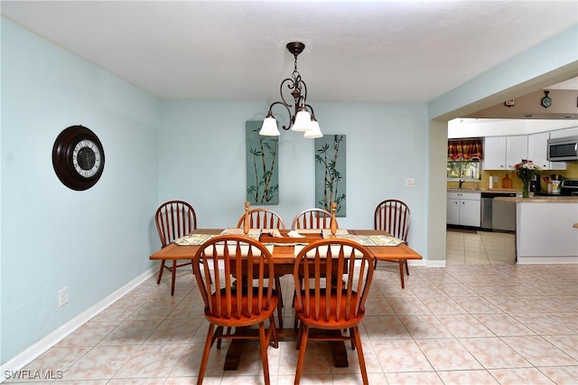 dining space featuring light tile patterned floors