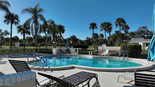 view of pool featuring a patio area