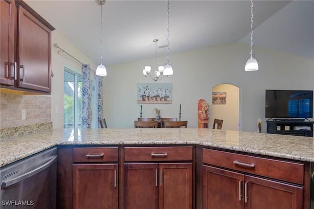 kitchen featuring hanging light fixtures, vaulted ceiling, stainless steel dishwasher, and backsplash