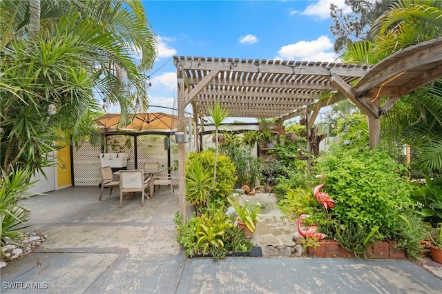 view of patio featuring a pergola