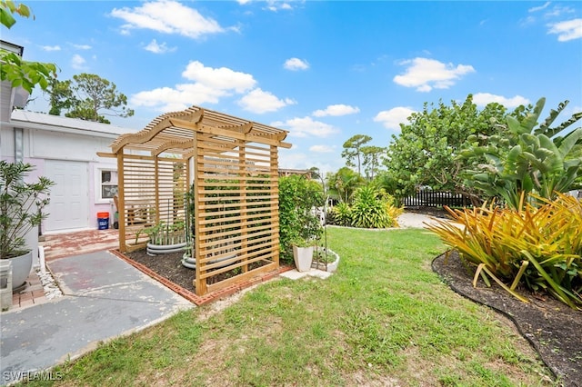 view of yard with a pergola