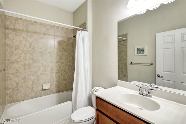 full bathroom featuring shower / bath combination with curtain, vanity, and toilet