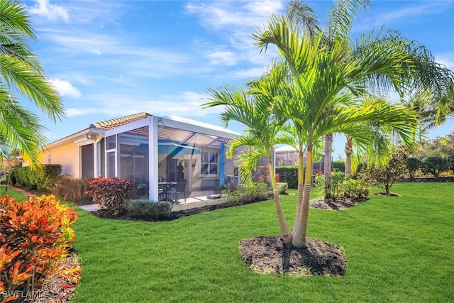 view of yard featuring glass enclosure