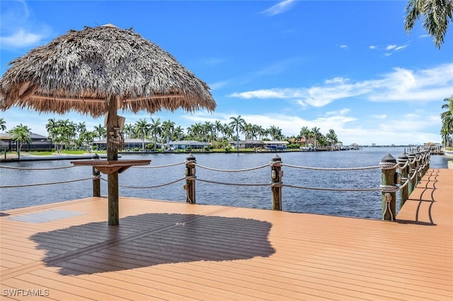 dock area with a water view and a gazebo