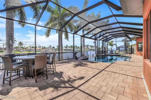 view of pool with a lanai and a patio area