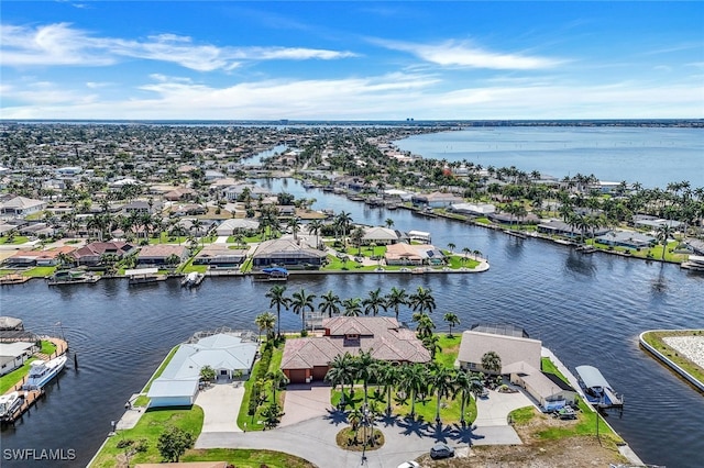 drone / aerial view featuring a water view