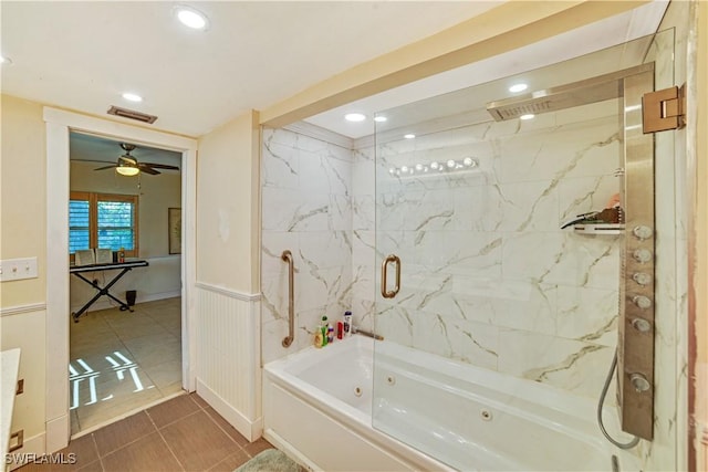 bathroom with tile patterned flooring, ceiling fan, and shower / bath combination with glass door