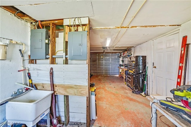 interior space featuring sink and electric panel