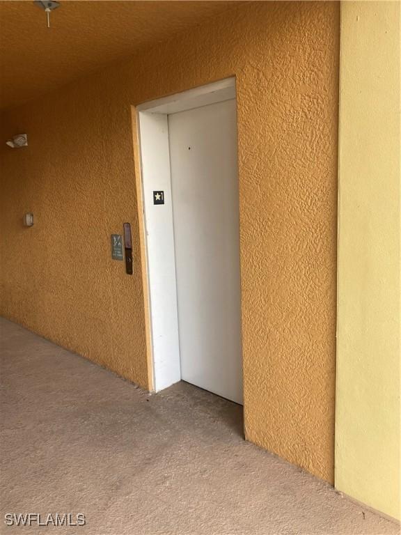 property entrance featuring elevator