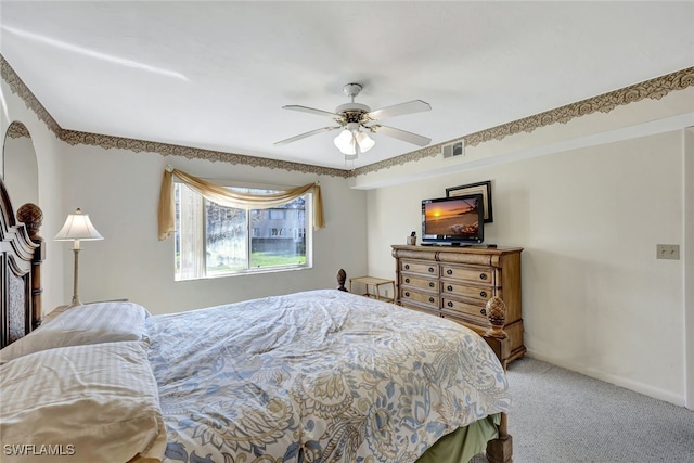 bedroom featuring ceiling fan and carpet floors