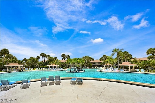 view of swimming pool featuring a gazebo and a patio area