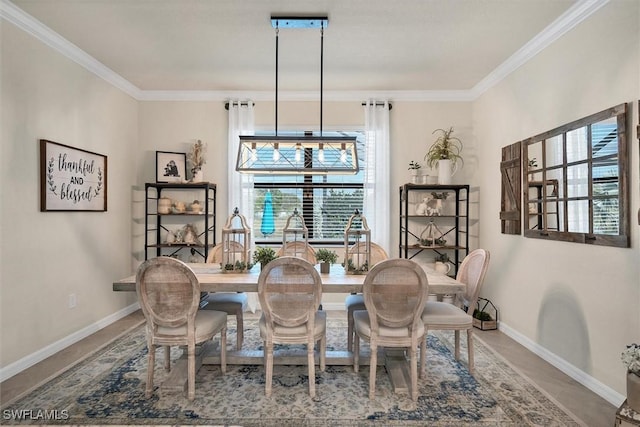 dining room with crown molding