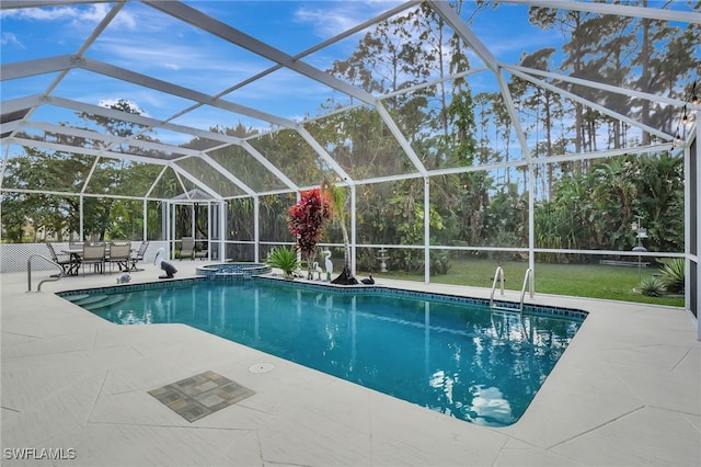 pool with a lanai, a patio, and an in ground hot tub