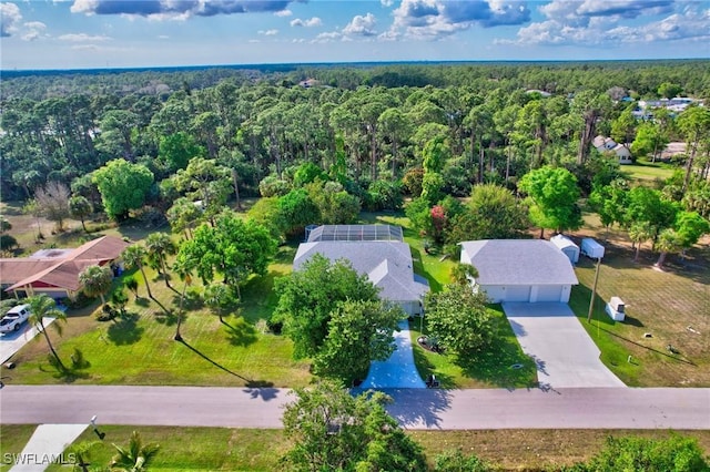 aerial view featuring a view of trees